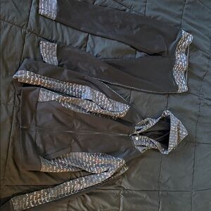 Black and Gray Hooded Jacket with Patterned Sleeves by Bebe